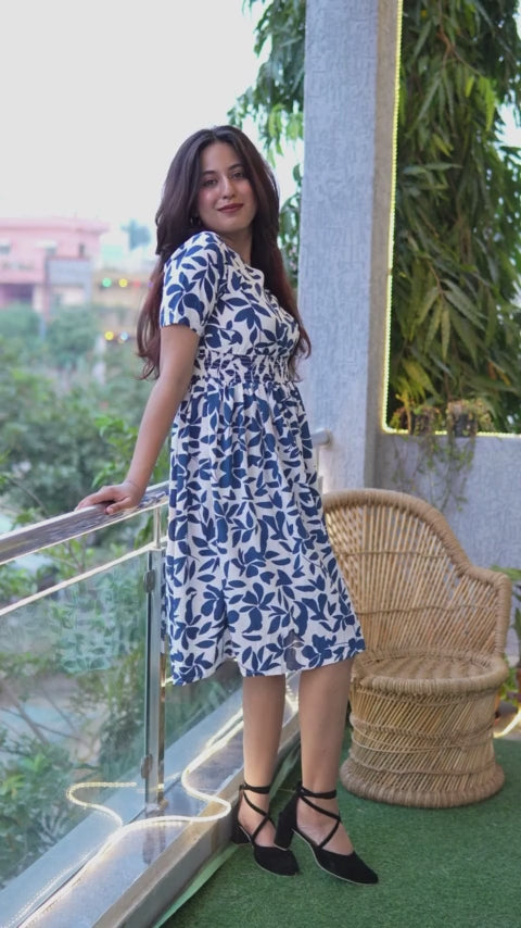 Feminine Flair Printed V-Neck Dress: Elevate your style with this solid fit & flare knee-length dress featuring shoulder straps and concealed zip. Perfect for a party look. Discover trendy knee-length dresses at Wyshlist. Shop now for a chic and feminine ensemble. 