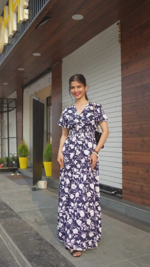 Midnight Blossom Maxi Dress: Embrace elegance in this blue floral printed crepe dress from Wyshlist. Featuring a V-neck, short sleeves, and a high slit, it combines style and comfort effortlessly. Perfect for casual occasions. Shop now!