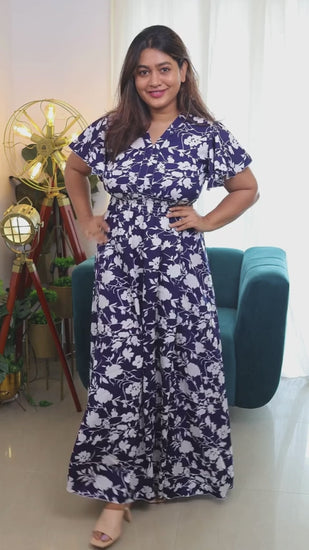 Midnight Blossom Maxi Dress: Embrace elegance in this blue floral printed crepe dress from Wyshlist. Featuring a V-neck, short sleeves, and a high slit, it combines style and comfort effortlessly. Perfect for casual occasions. Shop now!