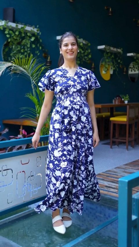 Midnight Blossom Maxi Dress: Embrace elegance in this blue floral printed crepe dress from Wyshlist. Featuring a V-neck, short sleeves, and a high slit, it combines style and comfort effortlessly. Perfect for casual occasions. Shop now!