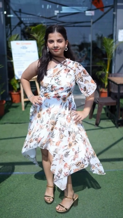 Blossom Beauty Regular Fit Midi Dress: One-shoulder, collar neck, 3/4 sleeves. White & floral, no-stretch fabric. Ideal for various occasions. Shop now, add to your Wyshlist! Knee-length dresses in India. COD, easy returns.