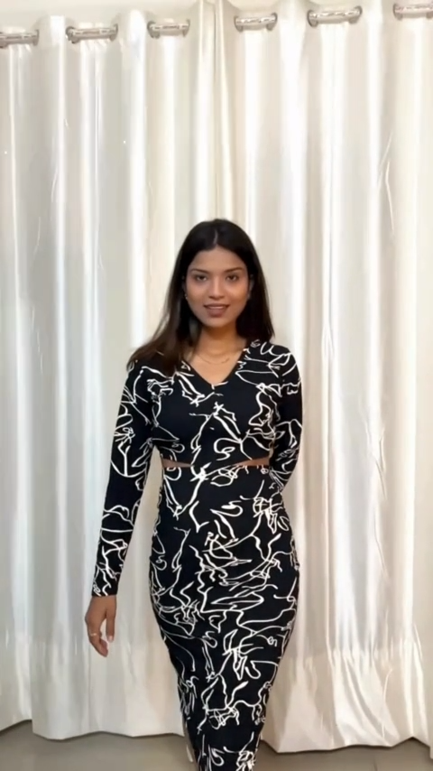 Mystic Black Crepe Printed Bodycon Dress by Wyshlist. Elevate your style with this elegant bodycon dress. Ideal for Western wear, it features a V-neck, full sleeves, and a flattering knee-length. The black ethnic motifs add a touch of sophistication. Machine washable for easy care.