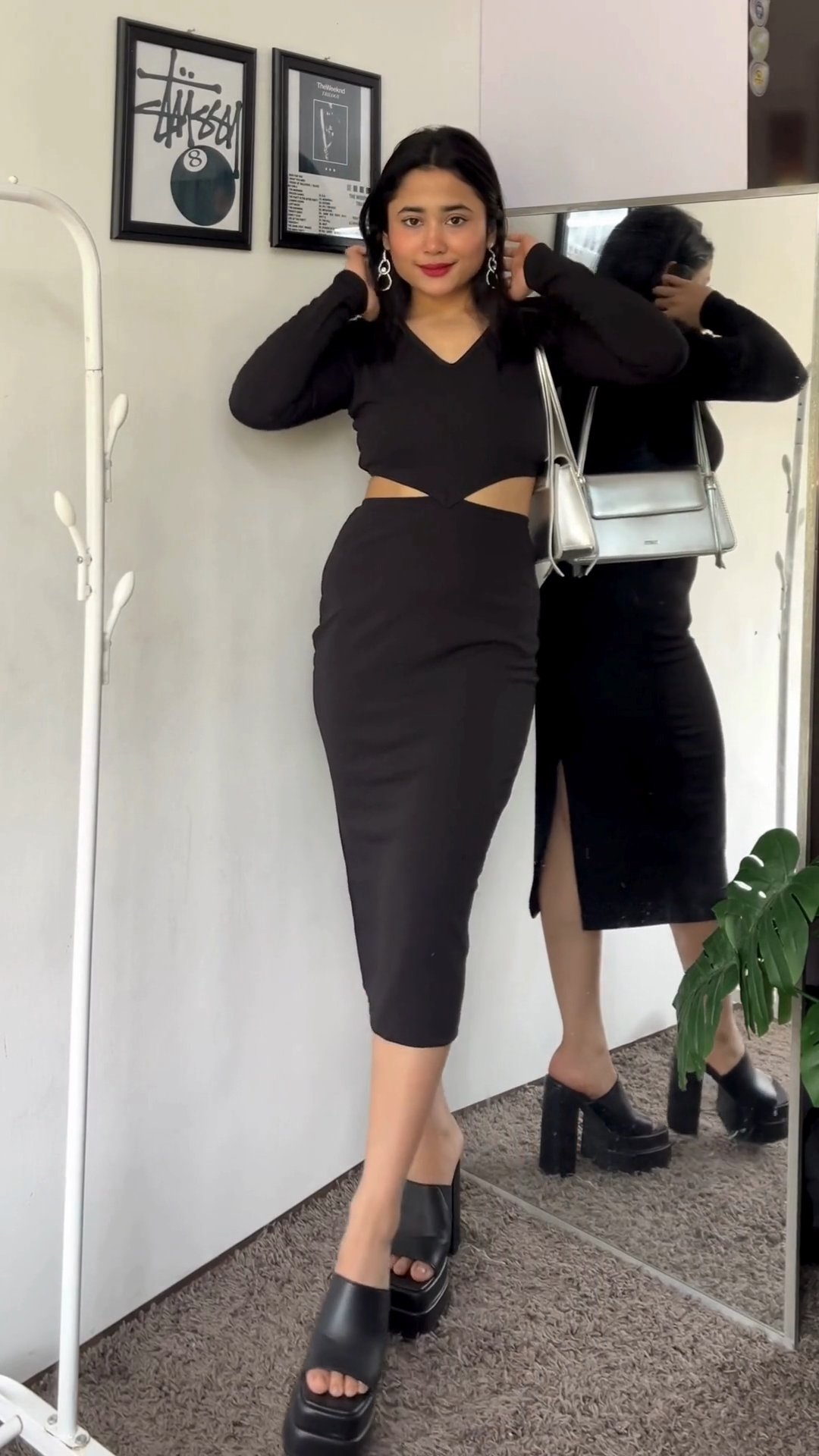 Sleek Black Full-Length Bodycon Dress - Elevate your style with this stunning black bodycon dress. V-neck, full sleeves, above knee length. Crafted from polyester, it offers a chic and elegant look. Machine wash for easy care. Embrace the bodycon trend for a stylish appearance. Shop now.