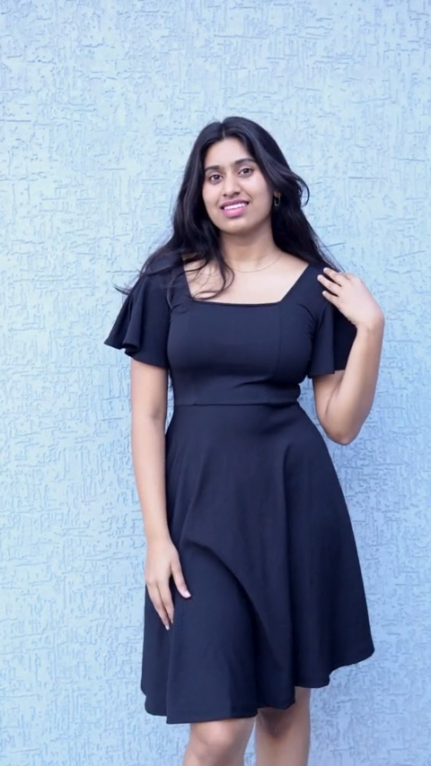 Modish Noir Square Neck Flare Dres: Elevate your style with this black A-line dress. It features a flattering square neck, half sleeves, and a flared silhouette. Crafted from polyester for comfort and style. Disscover fashion at Wyshlist. 