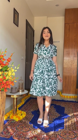 Feminine Flair Printed V-Neck Dress: Elevate your style with this solid fit & flare knee-length dress featuring shoulder straps and concealed zip. Perfect for a party look. Discover trendy knee-length dresses at Wyshlist. Shop now for a chic and feminine ensemble. 