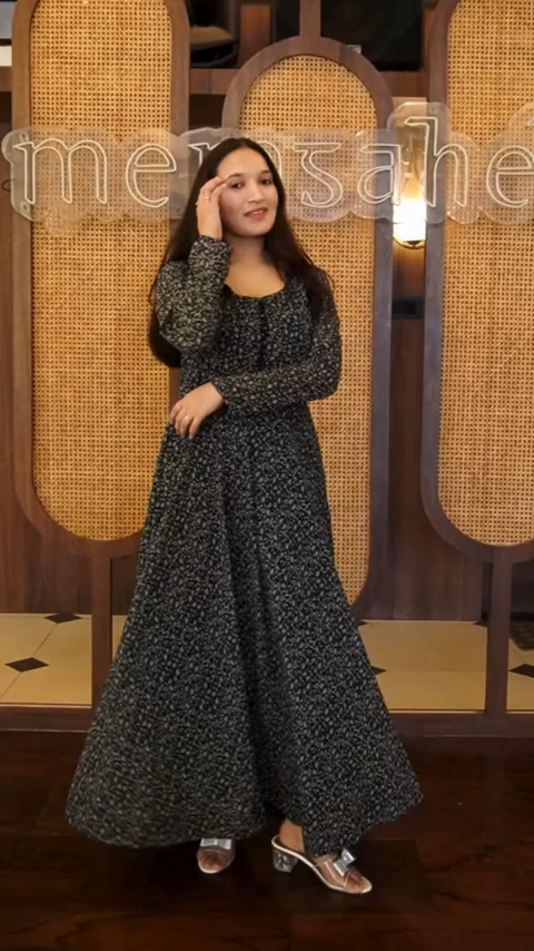 Elevate your style with our Midnight Paisley Flare Gown Dress. This black paisley printed maxi dress features a round neck, full sleeves, and intricate bead detailing on the front side. Made of georgette, it's perfect for any occasion. Shop now on Wyshlist for women's maxi dresses. Find your perfect fit today!