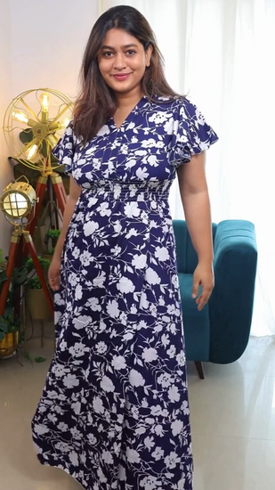 Midnight Blossom Maxi Dress: Embrace elegance in this blue floral printed crepe dress from Wyshlist. Featuring a V-neck, short sleeves, and a high slit, it combines style and comfort effortlessly. Perfect for casual occasions. Shop now!