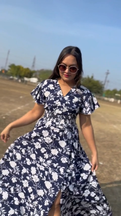 Midnight Blossom Maxi Dress: Embrace elegance in this blue floral printed crepe dress from Wyshlist. Featuring a V-neck, short sleeves, and a high slit, it combines style and comfort effortlessly. Perfect for casual occasions. Shop now!