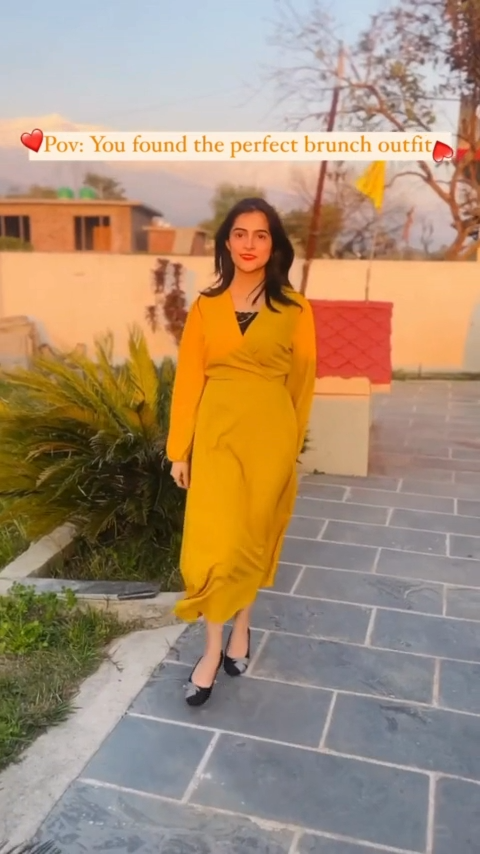 Embrace elegance with our 'Mustard Elegance Wrap Dress' This yellow midi dress, made from 100% Polyester, features a V-neck, bishop sleeves, and a belted wrap for a flattering A-line silhouette. Ideal for Western wear, it's perfect for formal occasions. Explore knee-length dresses, buy online in India for various occasions.